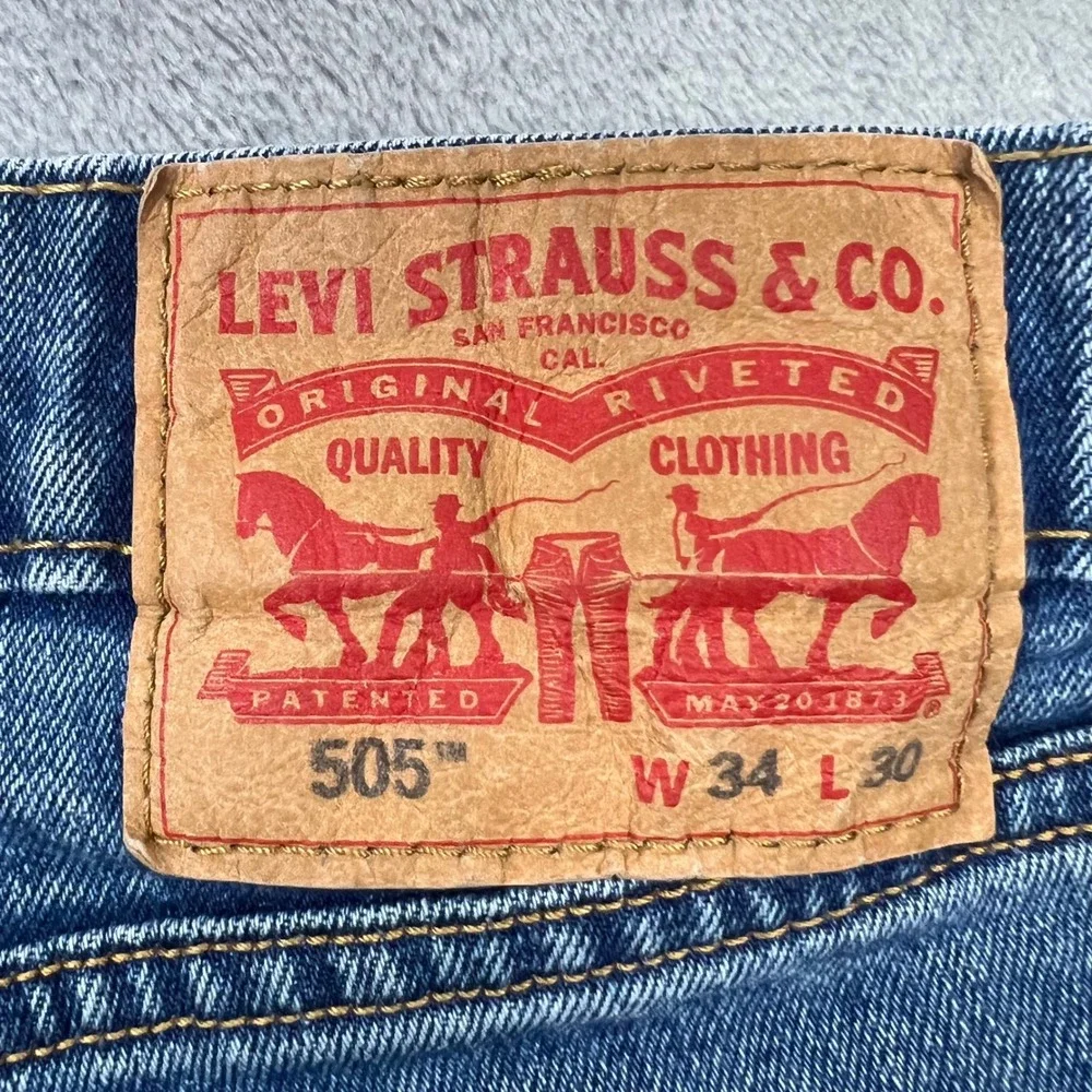 LEVI'S 505 Regular Fit Jeans Mens 34x30 Blue Medium Wash Distressed 00505-1454